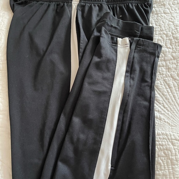 Reebok black with white line training pants.  Slim fit. Excellent shape - Picture 2 of 3